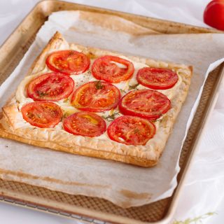 This tomato tart recipe is easy to make and even easier to eat - because it's so delicious! We've got the full recipe! #tomatotart