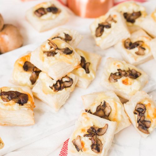 This mushroom puff pastry appetizer is not only easy to whip up, but they'll total impress your guests at your next dinner party. #puffpastryappetizers