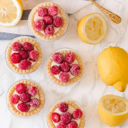 Raspberry lemon tarts make the perfect flavour profile - so sweet and so tart all at the same time! #minipies