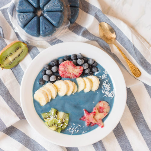 This Mermaid Smoothie Bowl has all the mermaid magic you need - and the deliciousness! Using an Evive Smoothie blend, this smoothie bowl came to life with the help of delicious, vibrant fruit like blueberries and kiwi. #smoothiebowl #breakfastgoals